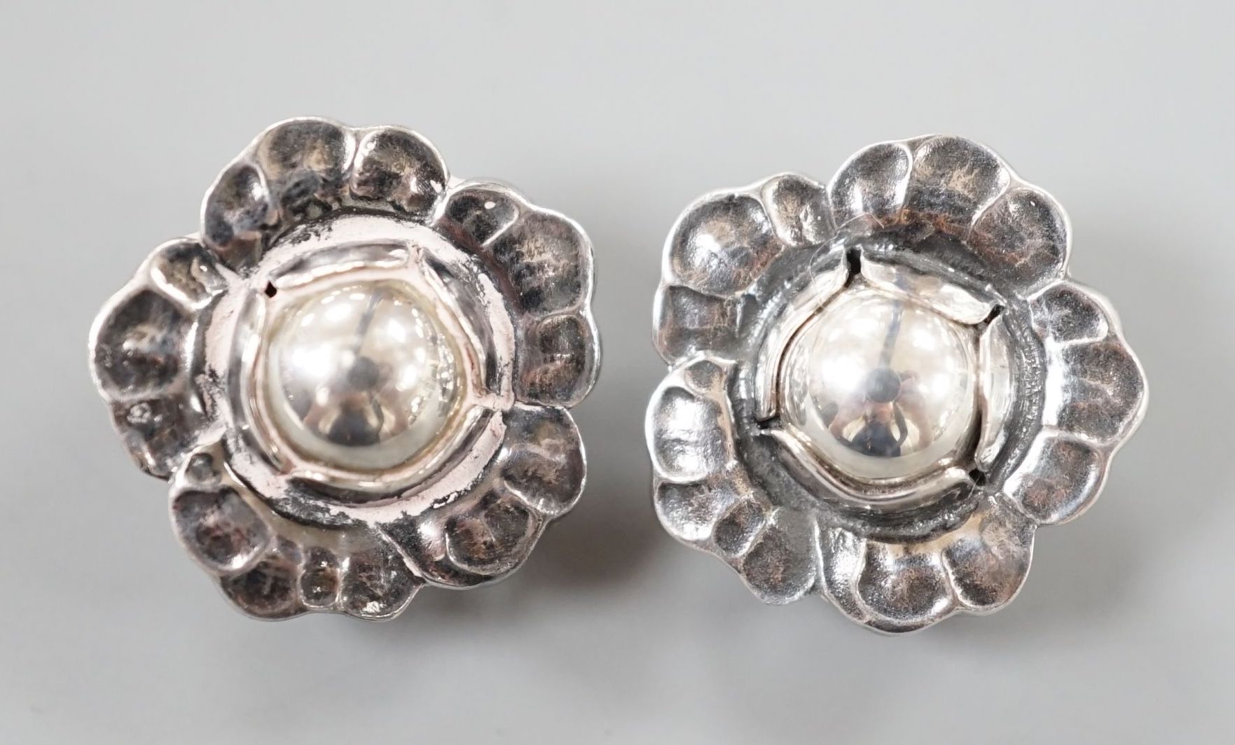 A pair of Georg Jensen sterling flower head ear clips, no.2002, 15mm.